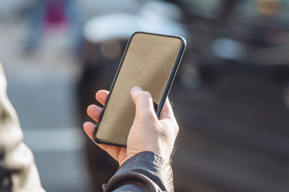 Hand holding smartphone