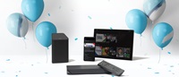 Xfinity products surrounded by balloons