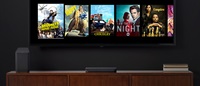TV showing show posters with X1 Voice Remote