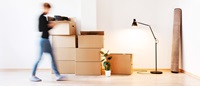 person moving boxes